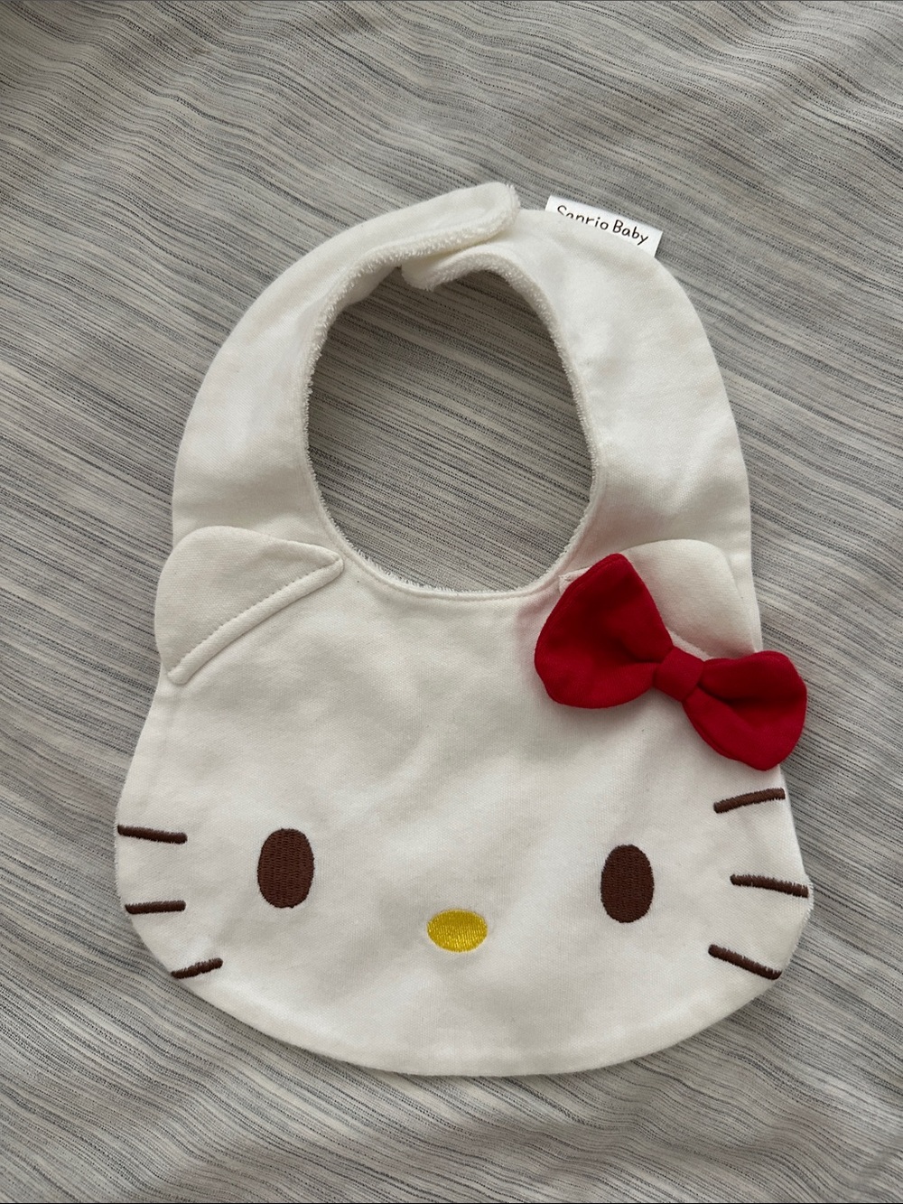 Sanrio White Hello Kitty Face Bib with Red Bow
